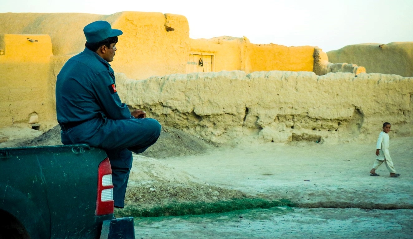 An-afghan-policeman-watching-the-sunset-in-Mowmand-village