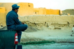 An-afghan-policeman-watching-the-sunset-in-Mowmand-village